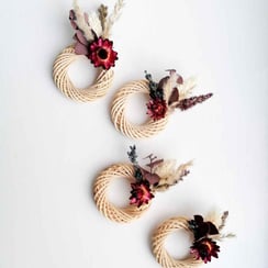 four mini wreaths with dried flowers