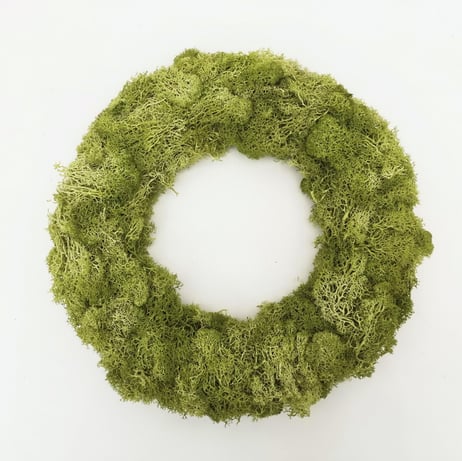 a green moss wreath